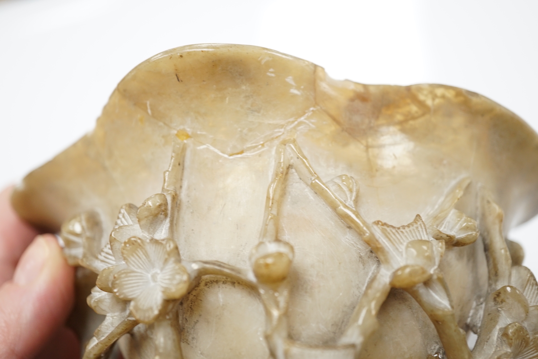 A Chinese carved soapstone libation cup, late 19th century and an elm cased inkstone